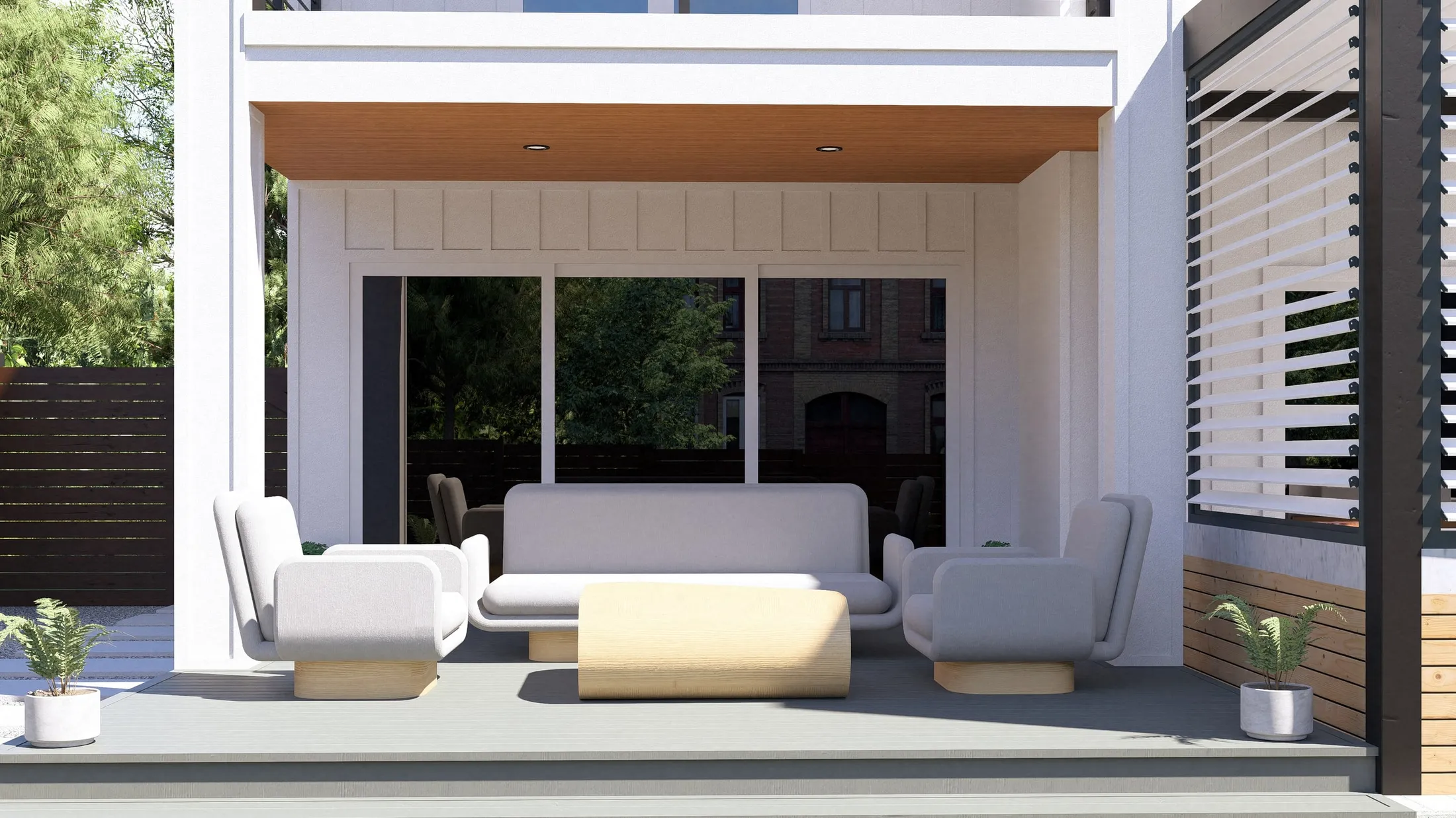 Covered lounge with sofa, armchairs and a sculptural timber coffee table