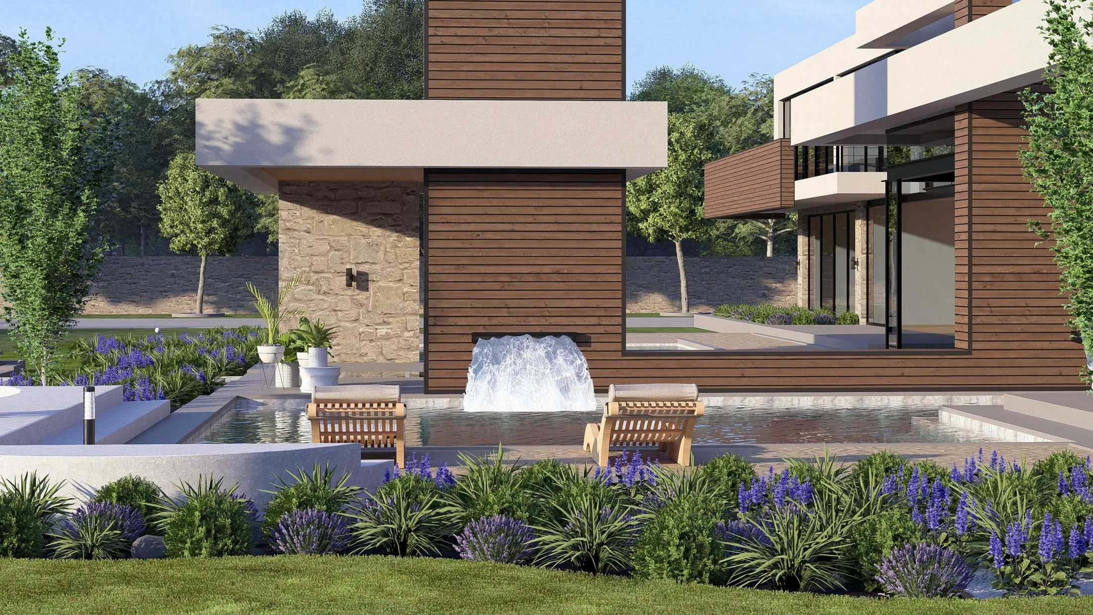 Stone-clad cascade pouring into the pool