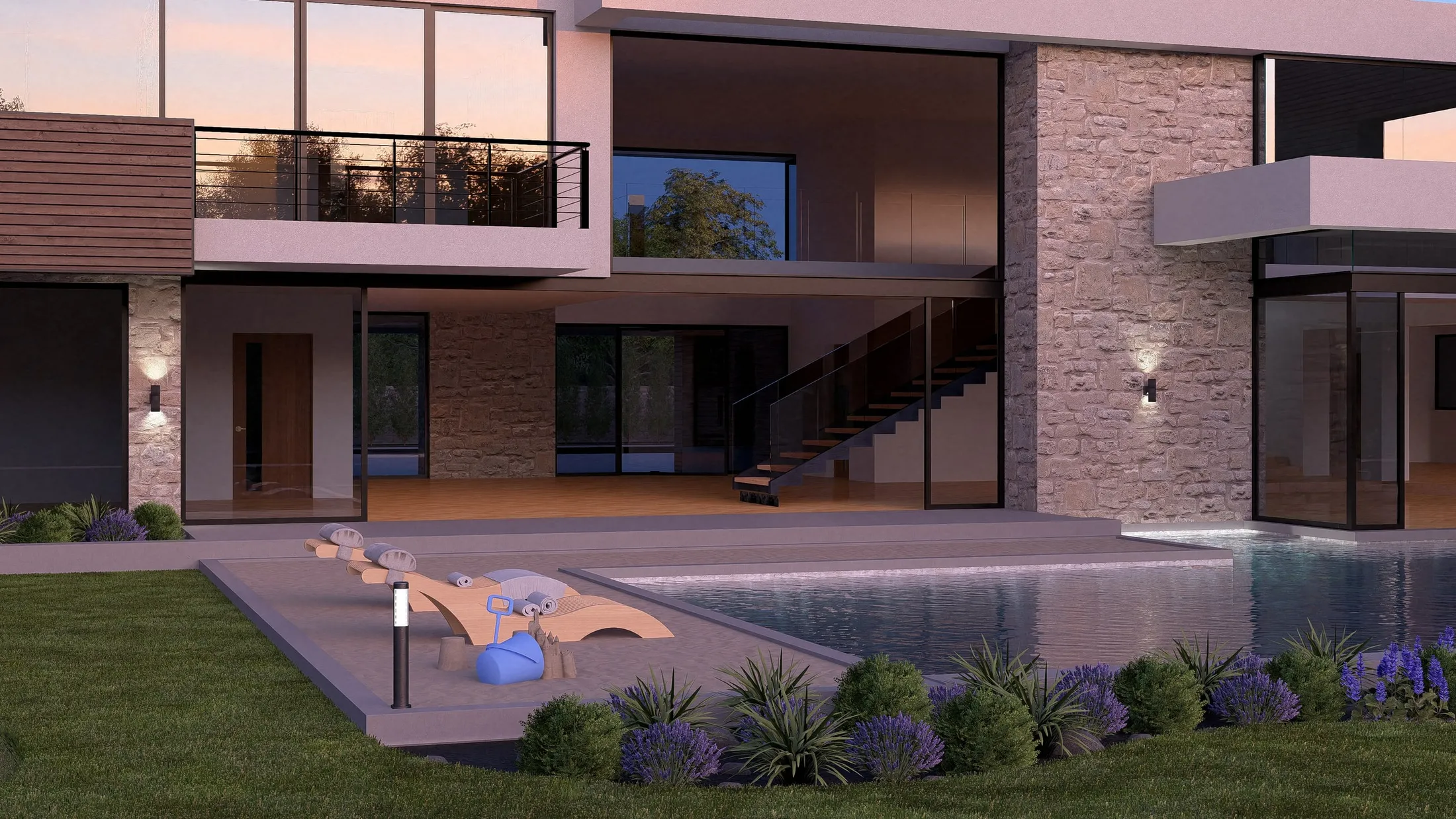 Villa and pool at dusk with interior lights on